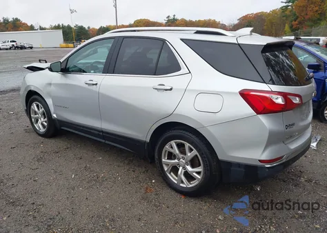 2018 Chevrolet Equinox Premier z USA, uszkodzony, nr VIN 3GNAXVEV2JS590947